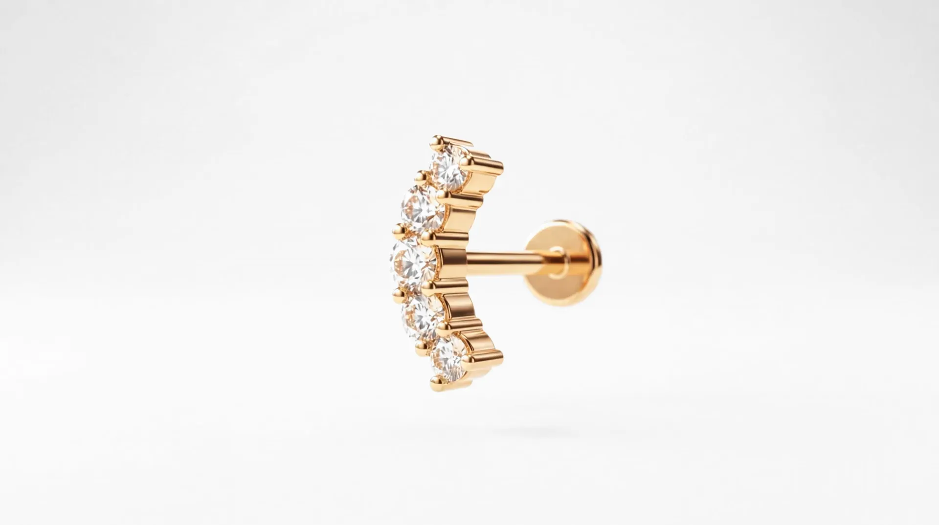 Bijou d'hélix en or 18 carats serti de pierres, sur fond blanc